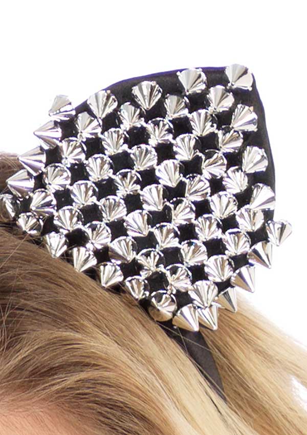 Whispers of Desire: Studded Cat Temptation